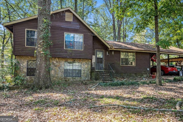 view of front of home featuring a carport