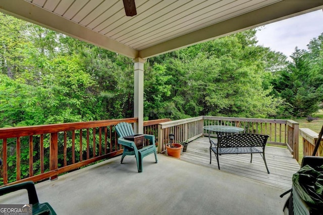 view of patio / terrace with ceiling fan and a wooden deck