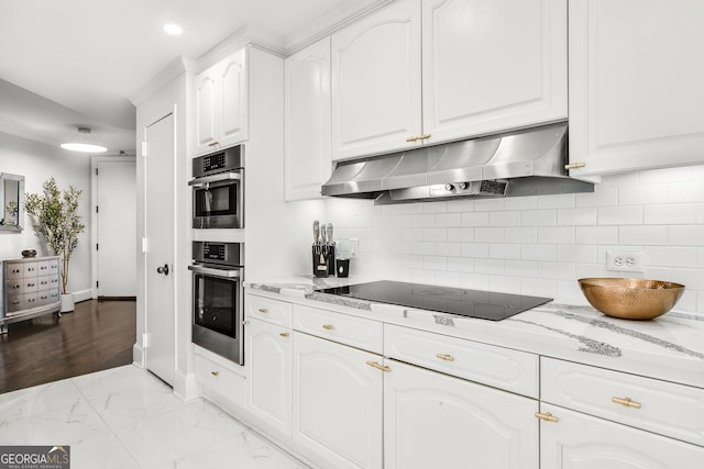 kitchen featuring backsplash, white cabinetry, light stone countertops, black electric cooktop, and stainless steel double oven