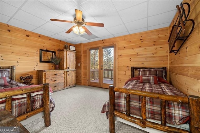 rear view of property with a wooden deck and a sunroom