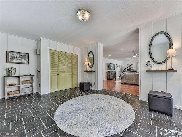 entrance foyer featuring a textured ceiling