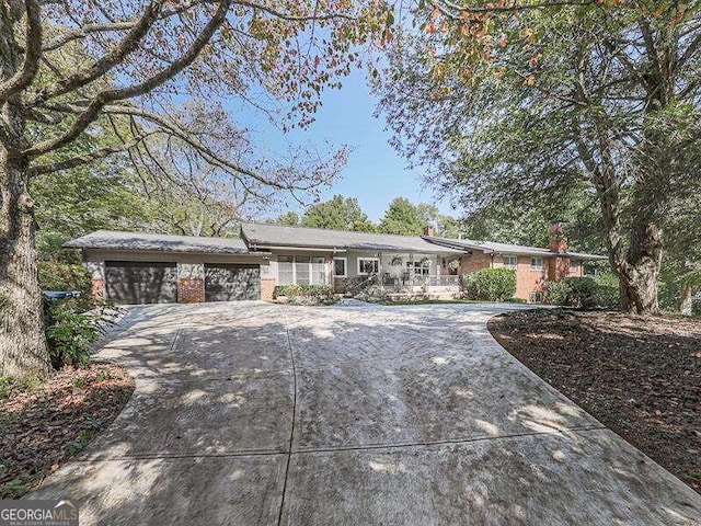 ranch-style home with a garage