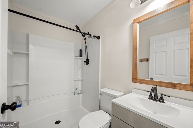 bathroom with walk in shower, vanity, and toilet