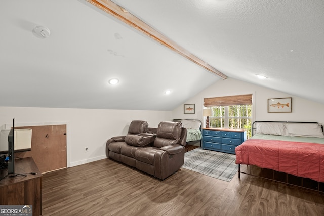 bedroom with a textured ceiling, vaulted ceiling with beams, and dark hardwood / wood-style floors