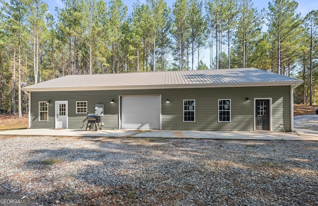 rear view of house with a patio