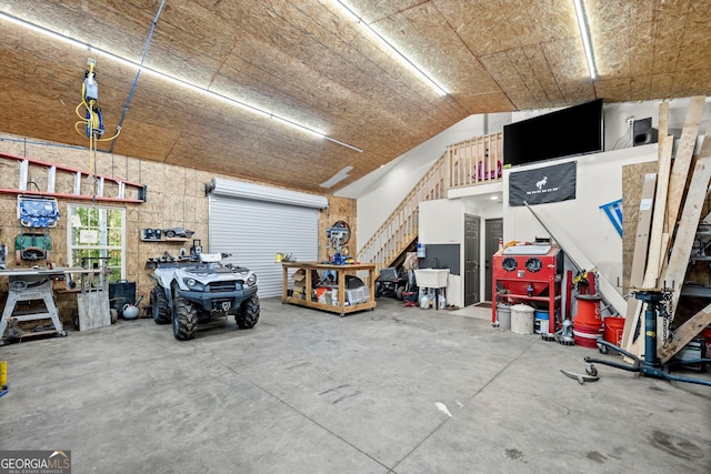 garage with a workshop area