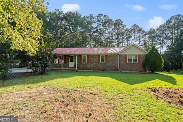 ranch-style house with a front yard