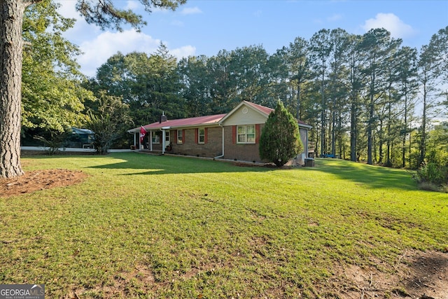 exterior space featuring a lawn