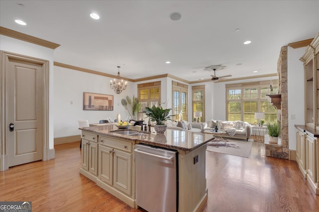 kitchen with hanging light fixtures, sink, stainless steel dishwasher, a kitchen island with sink, and crown molding