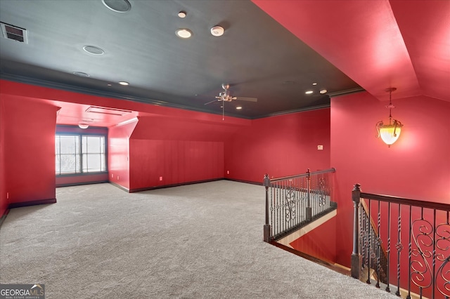 bonus room featuring ceiling fan, light colored carpet, and vaulted ceiling