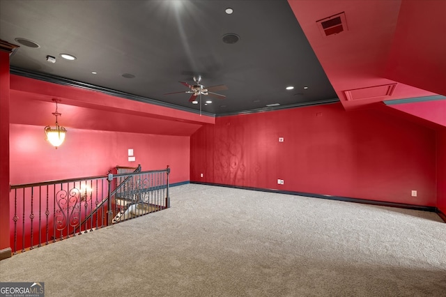 interior space featuring carpet floors and ceiling fan