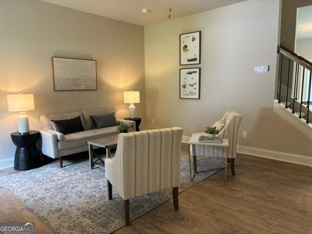 living room with dark hardwood / wood-style floors