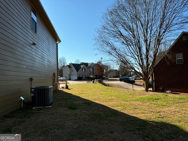 view of yard with cooling unit