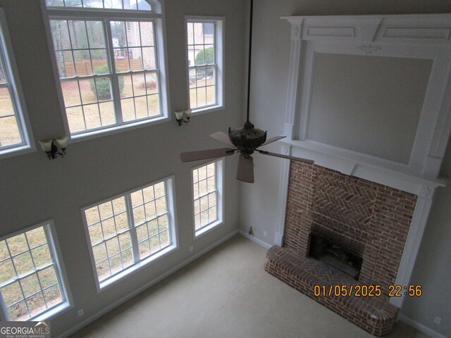 spare room featuring ornamental molding and light tile patterned flooring