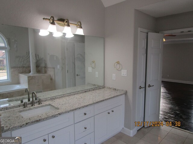 kitchen featuring island range hood, crown molding, sink, a kitchen island, and stainless steel appliances