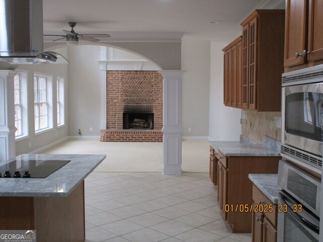 bathroom with tile patterned floors, ceiling fan, and vanity