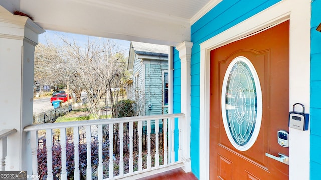 entrance to property with a porch