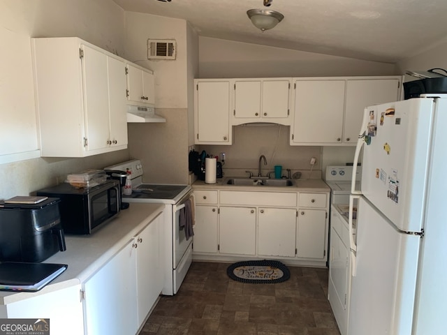 kitchen with white appliances, lofted ceiling, sink, and white cabinets