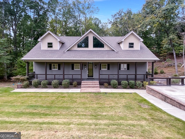 view of front of home featuring a front lawn and a porch