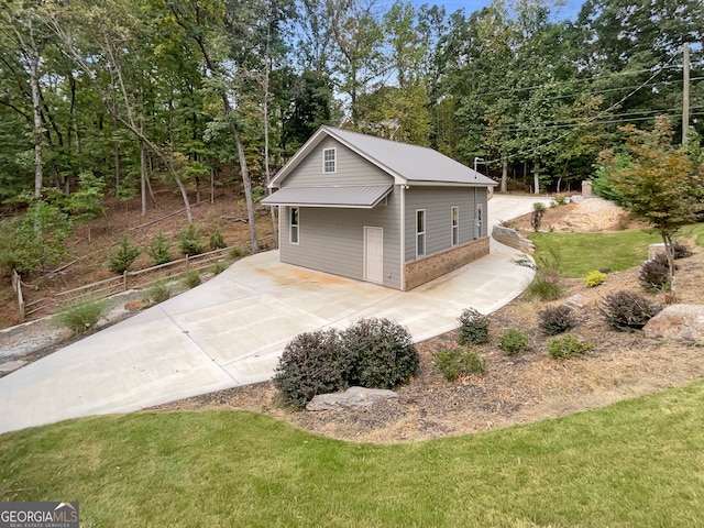 garage with a yard