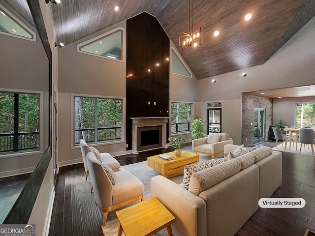 living room with high vaulted ceiling, wood ceiling, a chandelier, and dark wood-type flooring