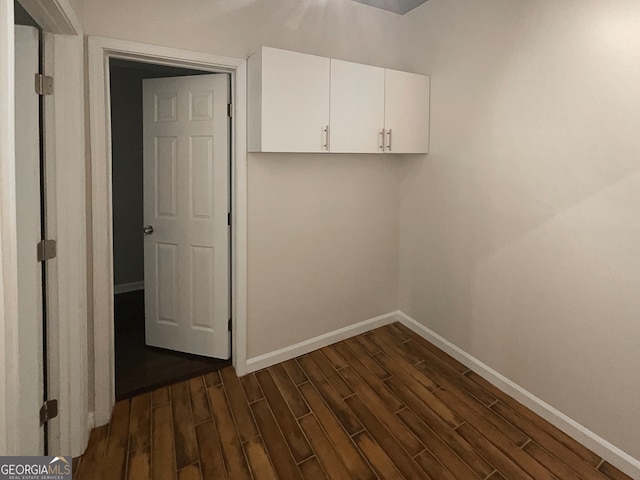 washroom with dark hardwood / wood-style floors