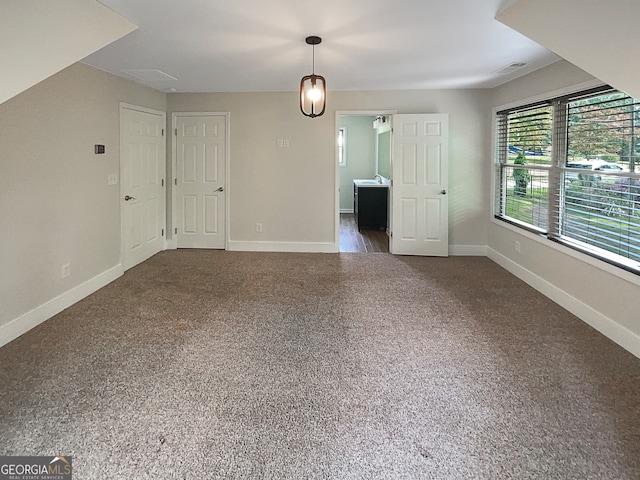 interior space with dark carpet