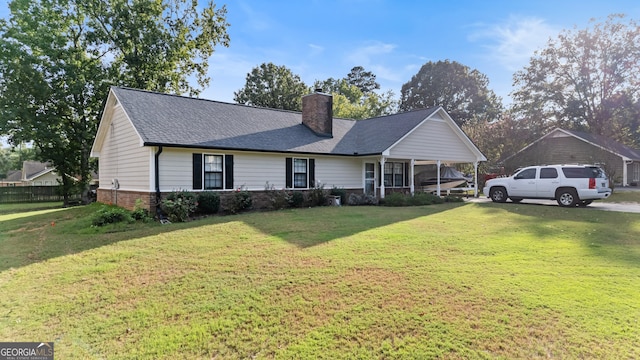 view of front of home with a front lawn