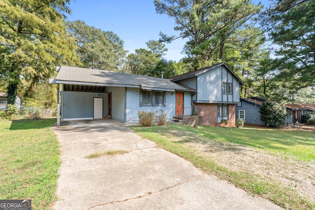 view of front facade with a front yard and a carport