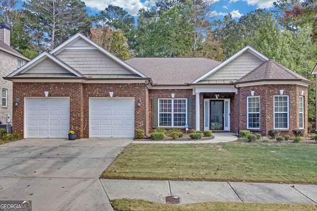 craftsman inspired home featuring brick siding, roof with shingles, concrete driveway, an attached garage, and a front lawn