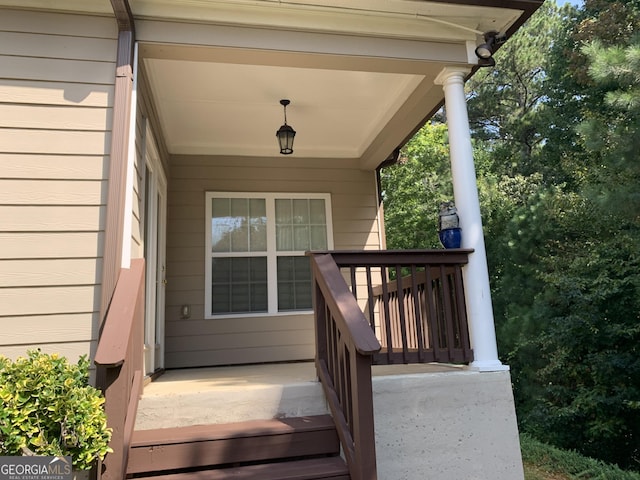 doorway to property featuring covered porch