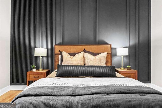 bedroom featuring hardwood / wood-style floors