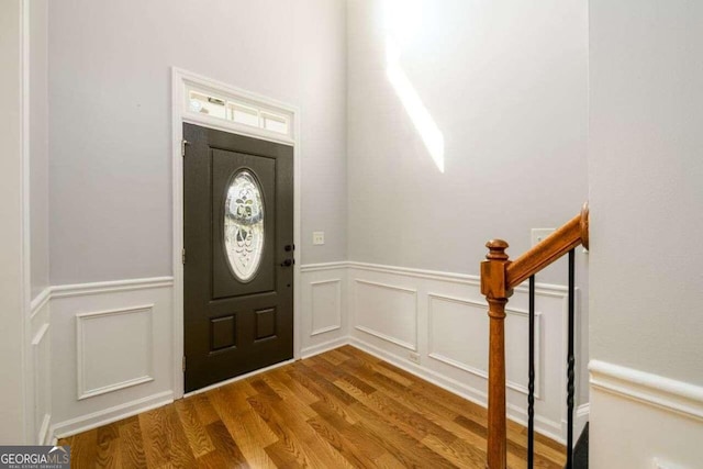 entrance foyer featuring wood-type flooring