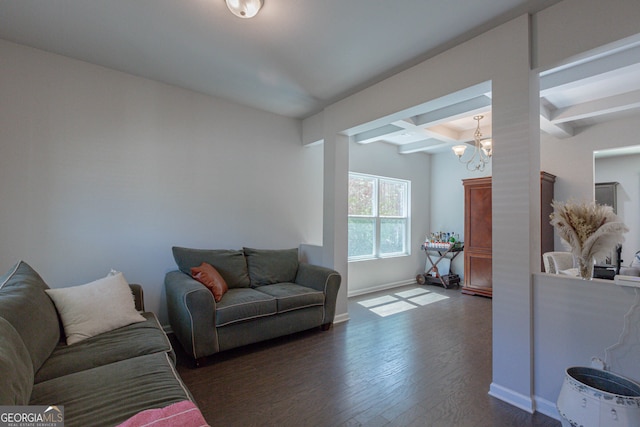 living room with a chandelier, beamed ceiling, and dark hardwood / wood-style floors