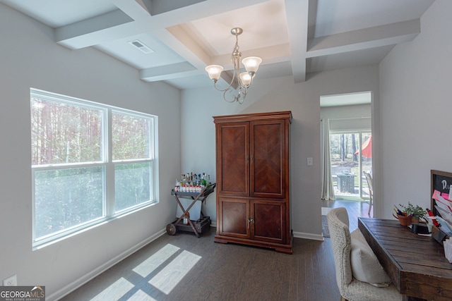 home office featuring an inviting chandelier, beam ceiling, coffered ceiling, and dark hardwood / wood-style floors