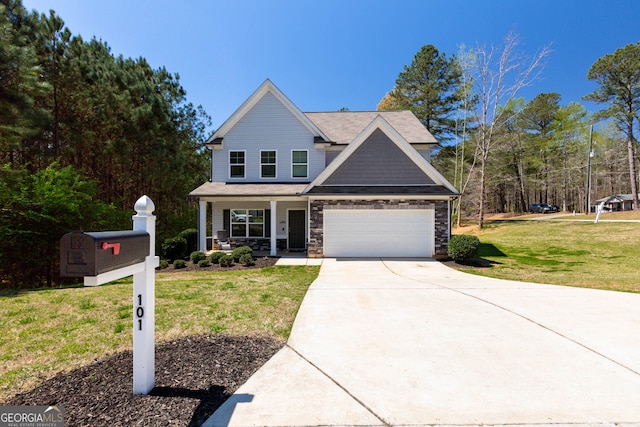 view of front of property with a garage, a porch, and a front lawn