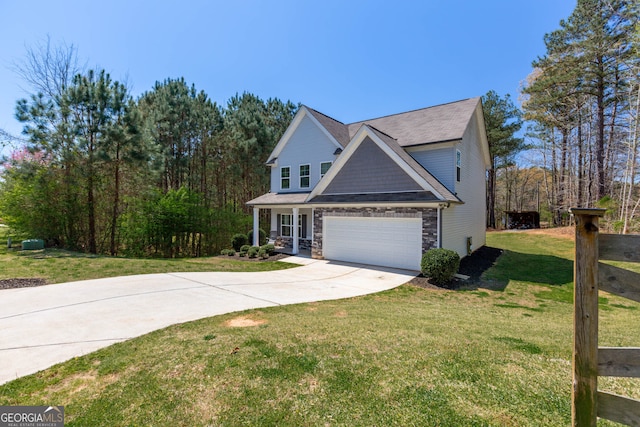 view of front of house featuring a garage and a front lawn