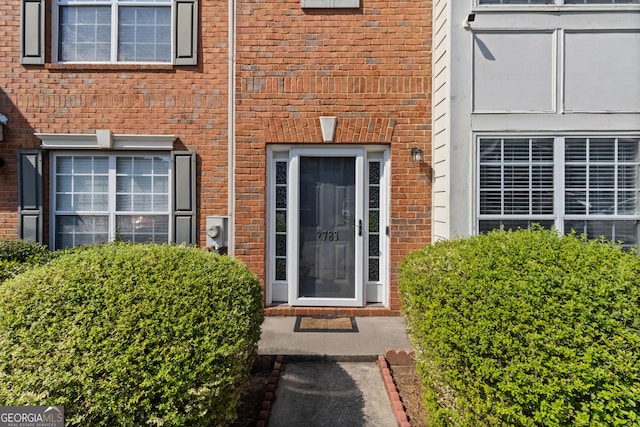 2783 Parkway Cv, Lithonia, GA 30058 - doorway to property featuring brick siding