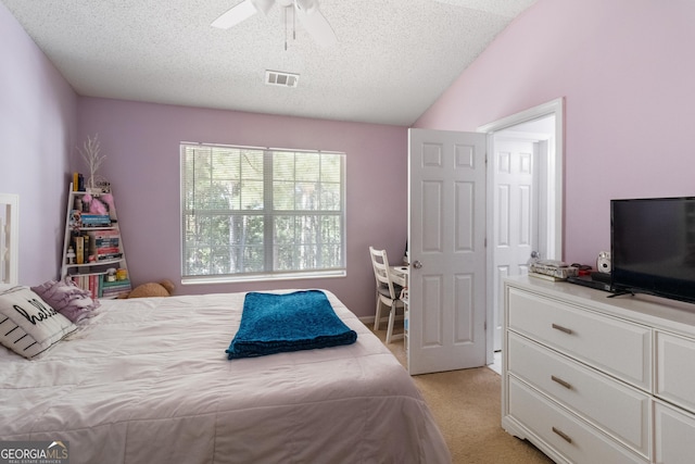 2783 Parkway Cv, Lithonia, GA 30058 - bedroom with visible vents, a textured ceiling, ceiling fan, and light colored carpet