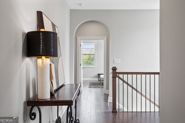 hallway featuring dark hardwood / wood-style flooring