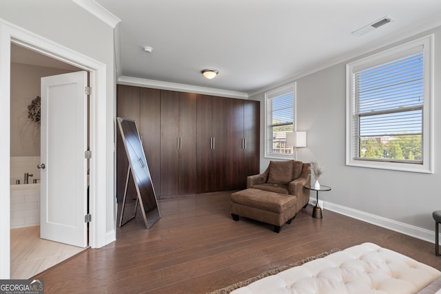 sitting room featuring hardwood / wood-style flooring