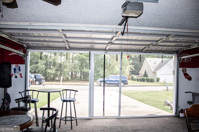 garage featuring a garage door opener