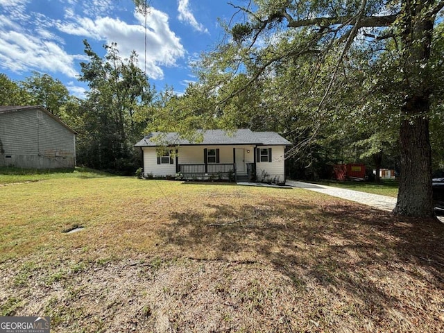 ranch-style house with a front yard