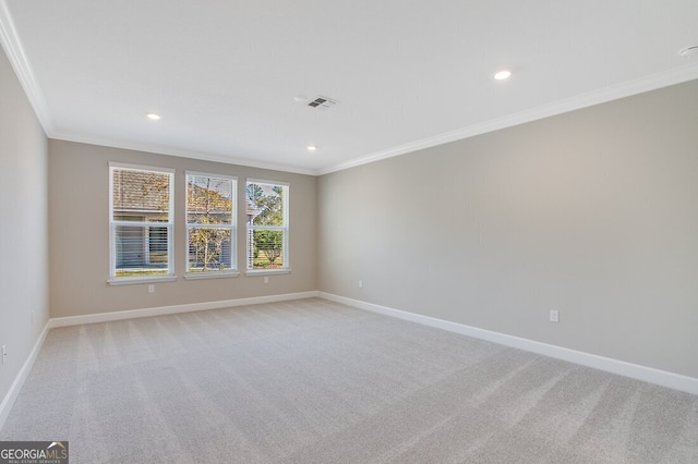 carpeted empty room with ornamental molding