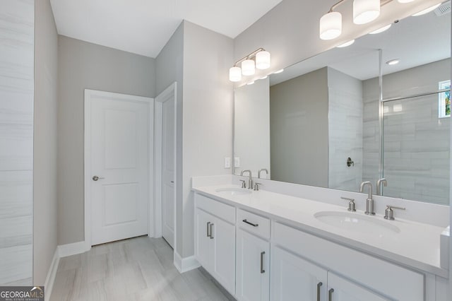 bathroom featuring vanity and walk in shower