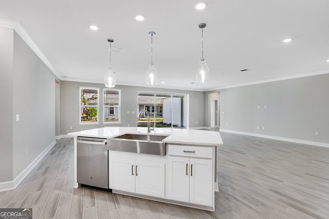 kitchen with white cabinetry, a center island with sink, sink, stainless steel dishwasher, and pendant lighting