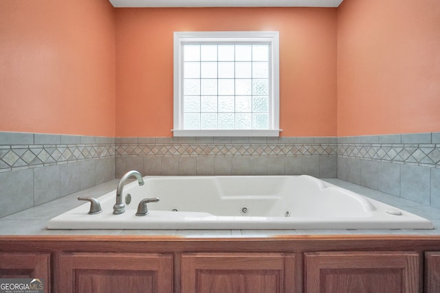 bathroom featuring a tub