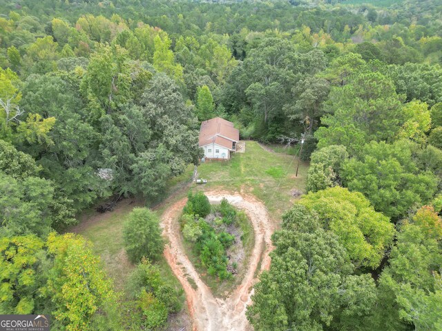 view of home's exterior featuring a yard and central AC