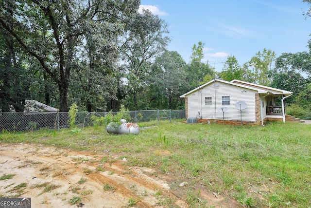 view of yard featuring cooling unit