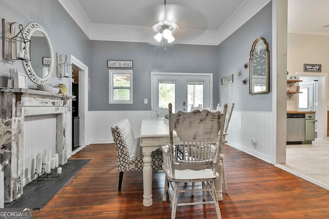 dining room featuring crown molding, french doors, and dark hardwood / wood-style flooring